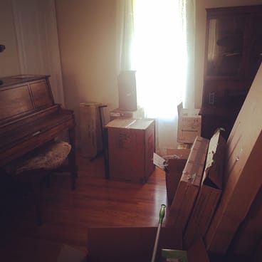 picture of Deanna's studio (full of boxes)
